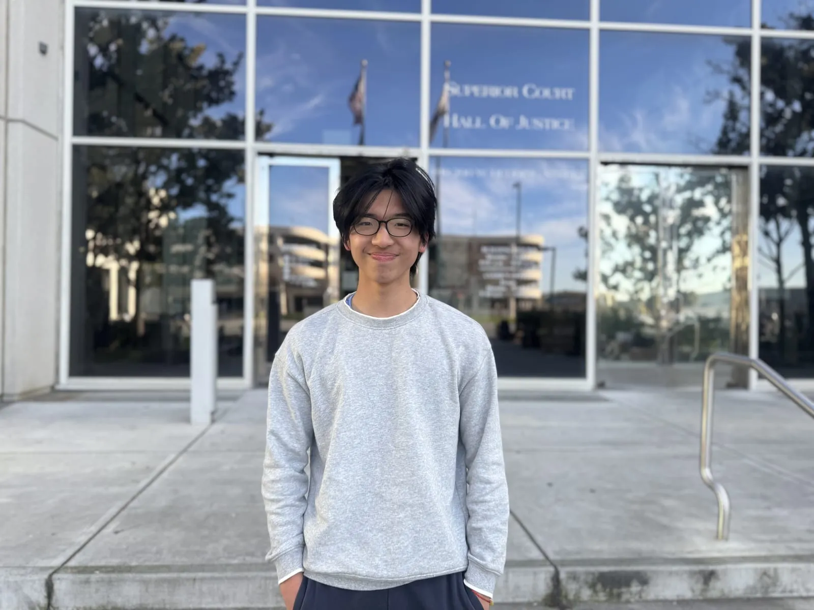 Ian standing outside the Superior Court Hall of Justice